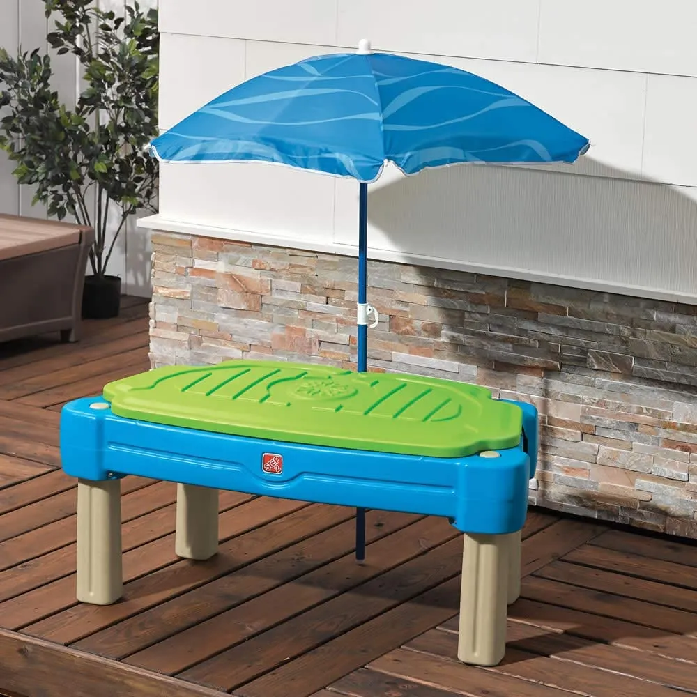 Cascading Cove With Umbrella